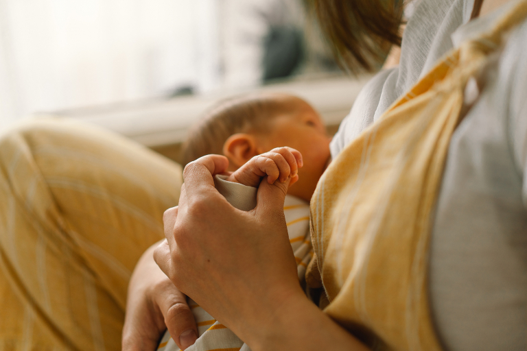 Newborn Baby Boy Sucking Milk