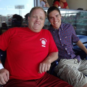 two men at baseball game