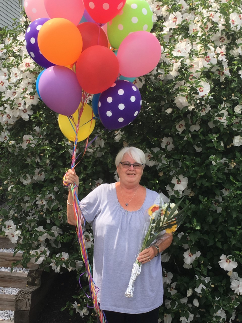 mary renn getting balloons flowers and rocker delivered to her house retired now years at CTI
