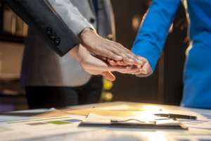 teamwork hands together for business success conce utc copy